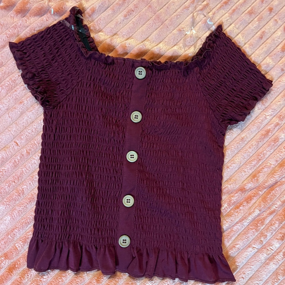 Girls M top in burgundy. Great used condition. The buttons are just for looks.